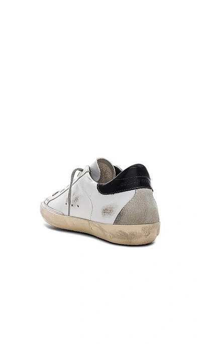 Shop Golden Goose Superstar Sneaker In White, Black & Cream Metal