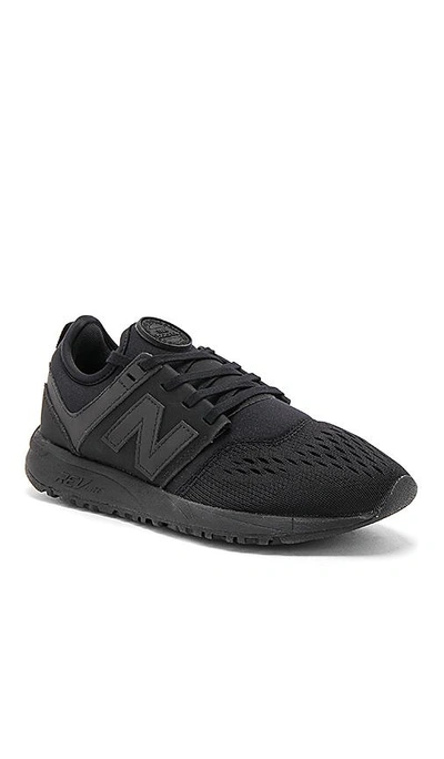 Shop New Balance 247 Sneaker In Black