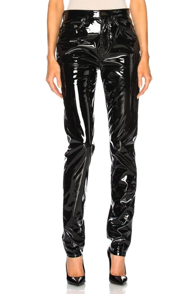 Shop Saint Laurent Vinyl Skinny Jeans In Black