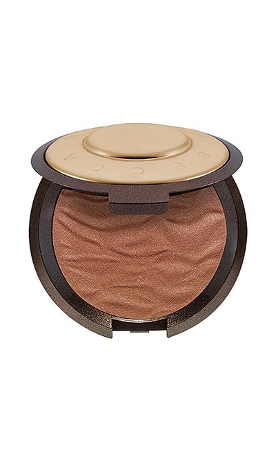 Shop Becca Cosmetics Sunlit Bronzer In Maui Nights