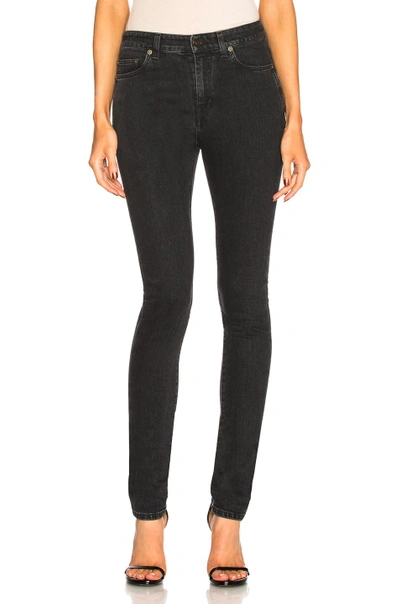 Shop Saint Laurent Medium Rise Skinny Jeans In Black