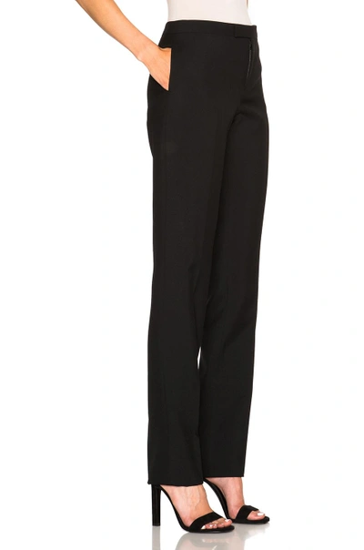 Shop Saint Laurent Low Waist Gabardine Trousers In Black