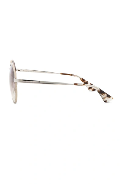 Shop Prada Round Sunglasses In Silver & Light Brown