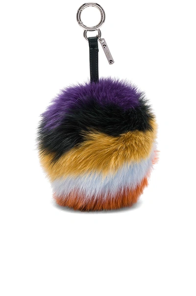 Shop Fendi Rainbow Fox Fur Pom Pom Charm In Stripes,purple,yellow,orange,black