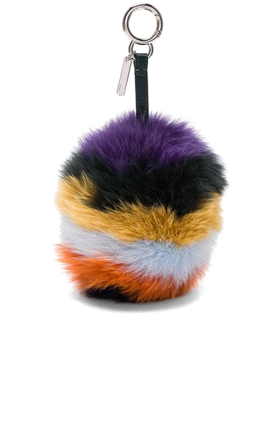 Shop Fendi Rainbow Fox Fur Pom Pom Charm In Stripes,purple,yellow,orange,black