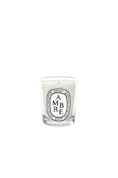 Shop Diptyque Ambre Scented Candle In N,a