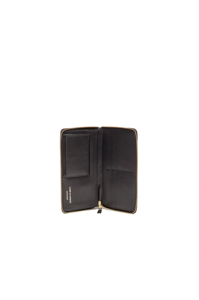 Shop Comme Des Garçons Comme Des Garcons Long Star Embossed Wallet In Black