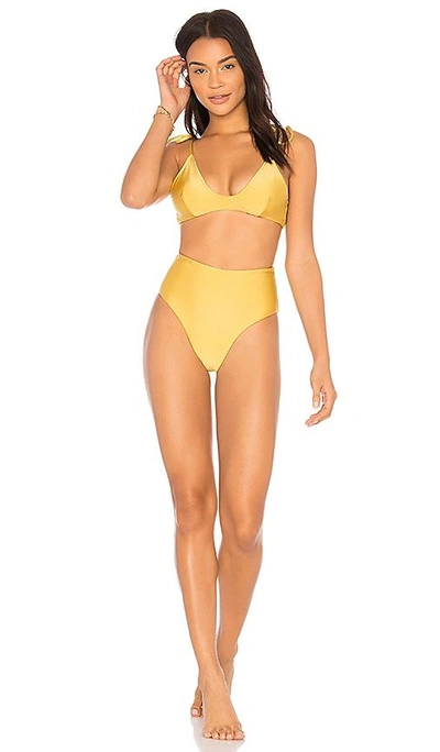 Shop Midsommar Swim X Revolve Crescent Bikini Top In Gold Metallic
