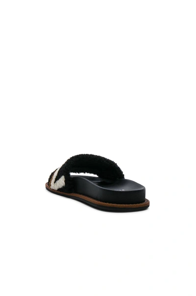 Shop Fendi Stripy Shearling Sandals In Black