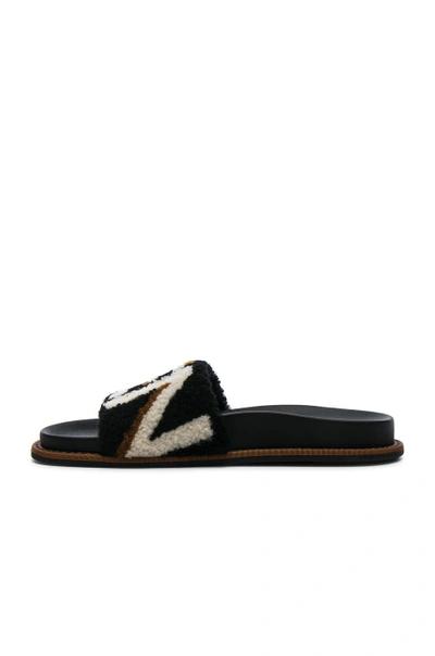 Shop Fendi Stripy Shearling Sandals In Black