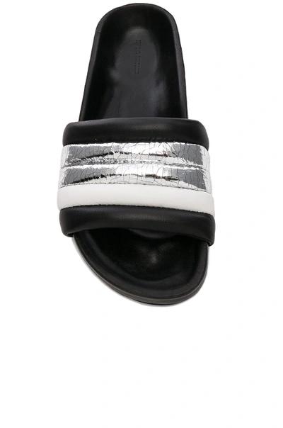 Shop Isabel Marant Leather Hellea Slides In Black. In Silver