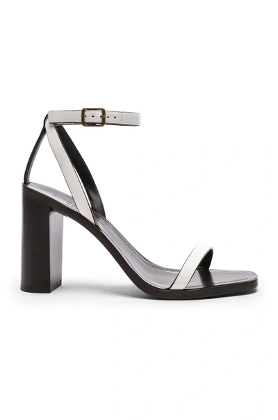 Shop Saint Laurent Leather Loulou Ankle Strap Sandals In White