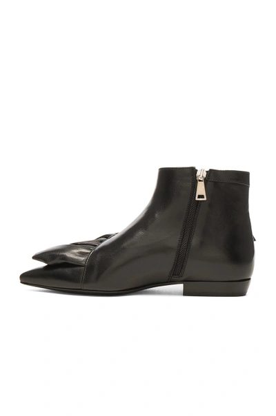 Shop Jw Anderson Leather Ruffle Booties In Black