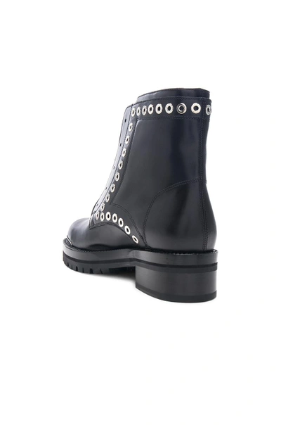Shop Alexander Mcqueen Eyelet Zip Up Leather Boots In Black