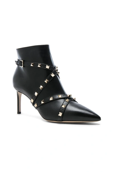 Shop Valentino Studwrap Leather Booties In Black