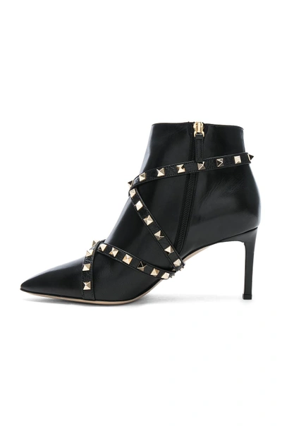 Shop Valentino Studwrap Leather Booties In Black