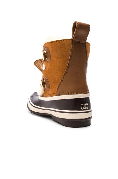 Shop Chloé Chloe X Sorel Shearling & Suede Hiking Boots In Brown