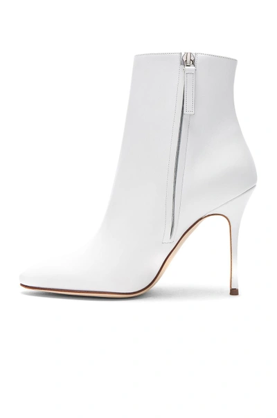 Shop Manolo Blahnik Leather Insopo 105 Booties In White