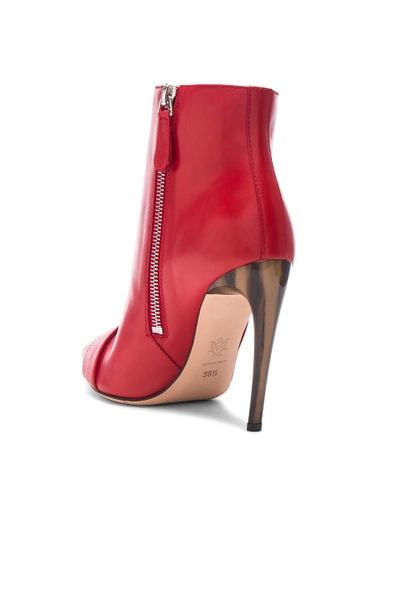 Shop Alexander Mcqueen Zip Front Leather Booties In Red