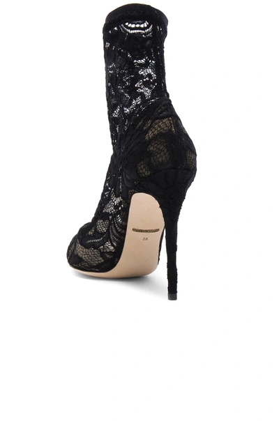 Shop Dolce & Gabbana Stretch Lace Booties In Black.