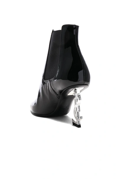 Shop Saint Laurent Patent Opium Monogramme Heeled Boots In Black & Silver
