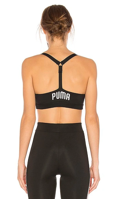 Shop Puma Explosive Sports Bra In Black