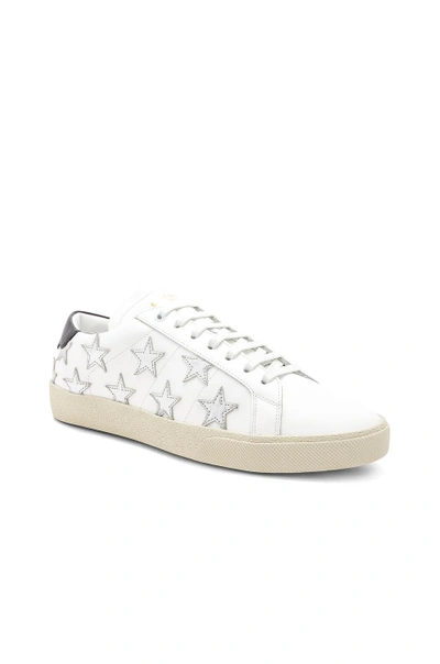 Shop Saint Laurent Star Leather Low Top Sneakers In White & Silver