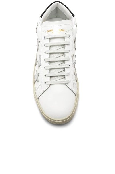 Shop Saint Laurent Star Leather Low Top Sneakers In White & Silver