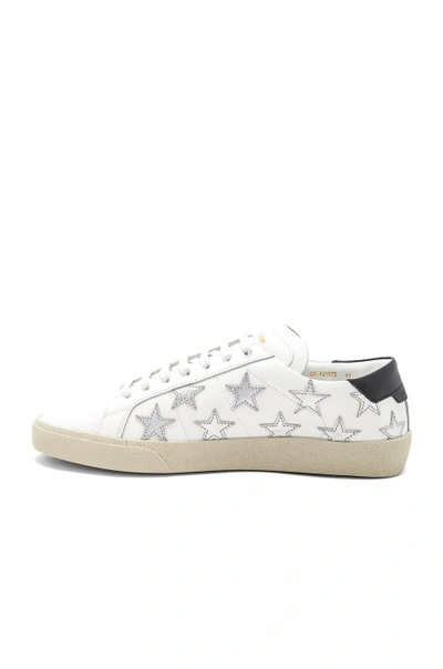 Shop Saint Laurent Star Leather Low Top Sneakers In White & Silver