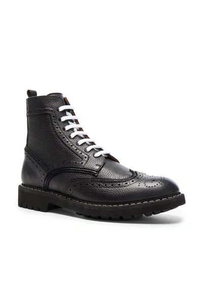 Shop Givenchy Leather Wingtip Boots In Black