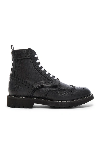 Shop Givenchy Leather Wingtip Boots In Black