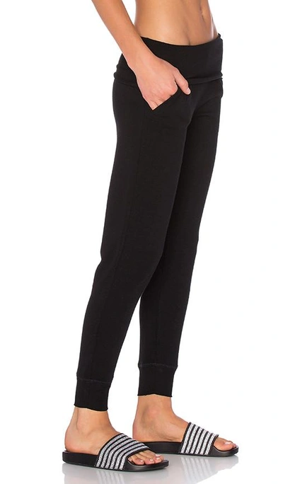 Shop Beyond Yoga Cozy Fleece Foldover Sweatpant In Black