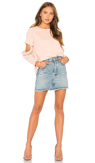 Shop Central Park West Clover Cut Out Ruffle Sweatshirt In Blush