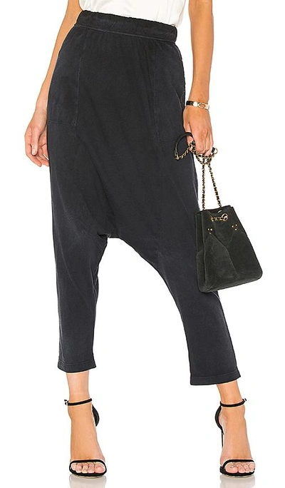 Shop Raquel Allegra Cropped Slouchy Pant In Black