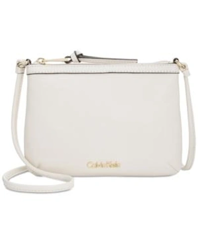 Shop Calvin Klein Carrie Pebble Leather Crossbody In White