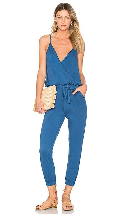 Shop Bobi Supreme Jersey Surplice Jumpsuit In Navy. In Overboard