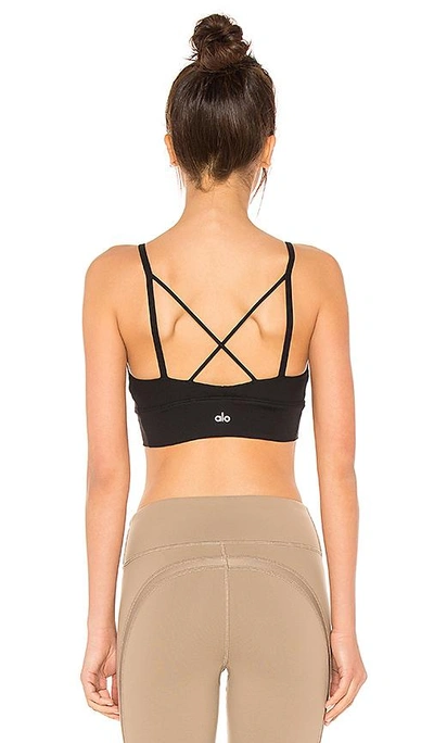 Shop Alo Yoga Deluxe Sports Bra In Black