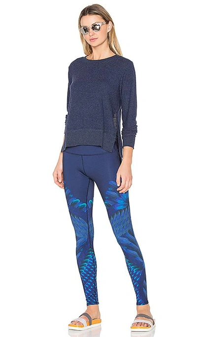 Shop Alo Yoga Glimpse Pullover In Rich Navy Heather