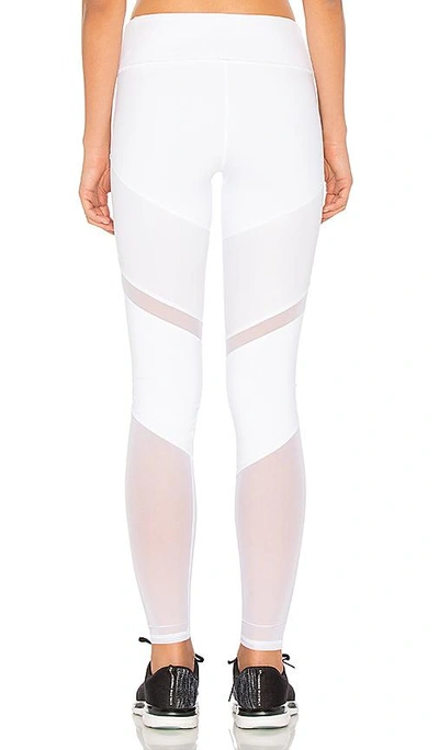 Shop Alo Yoga Sheila Legging In White & Glossy White