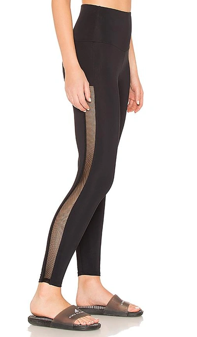 Shop Onzie Side Runner Legging In Black