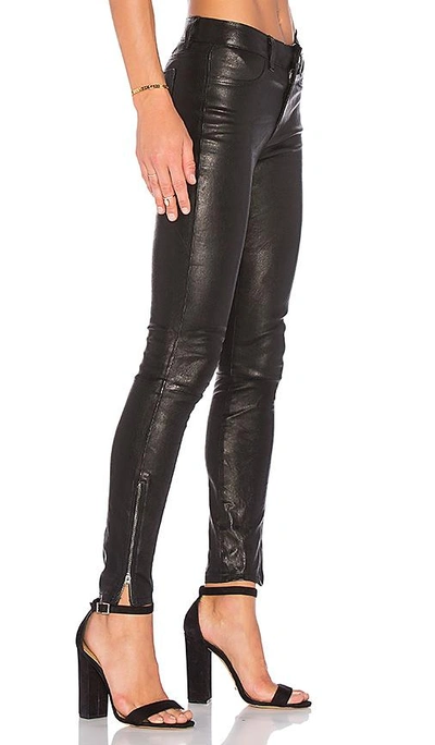 Shop J Brand Mid Rise Leather Skinny In Black