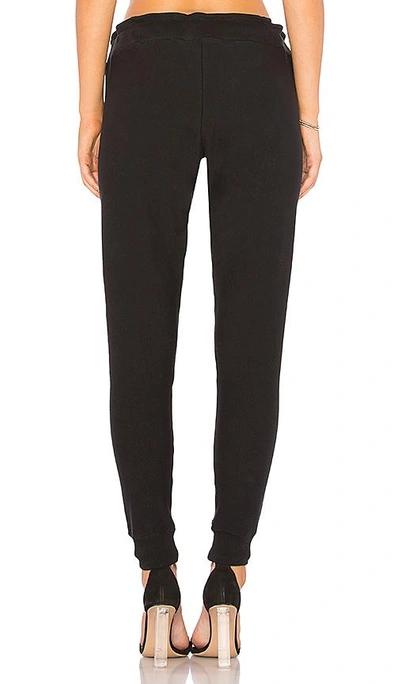 Shop Plush Super Soft Fleece Lined Skinny Sweatpant In Black