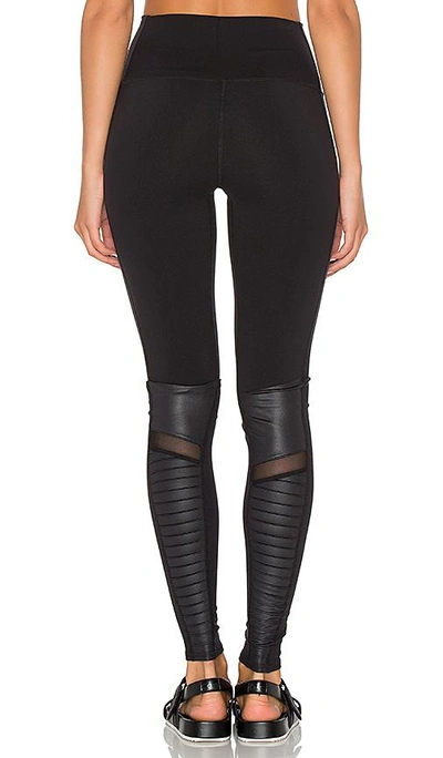 Shop Alo Yoga High Waisted Moto Legging In Black & Black Glossy