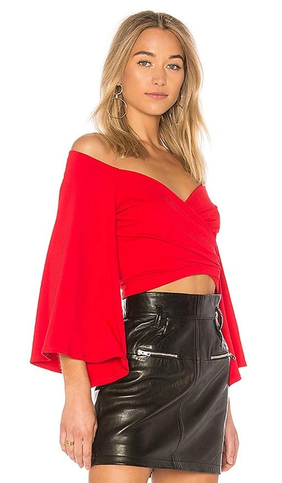 Shop Susana Monaco Bell Sleeve Wrap Top In Red
