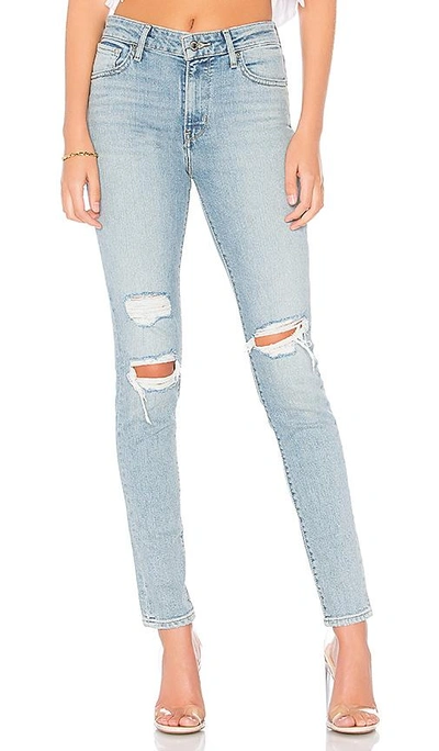 Shop Levi's 721 High Rise Skinny In Blue. In Worn & Torn