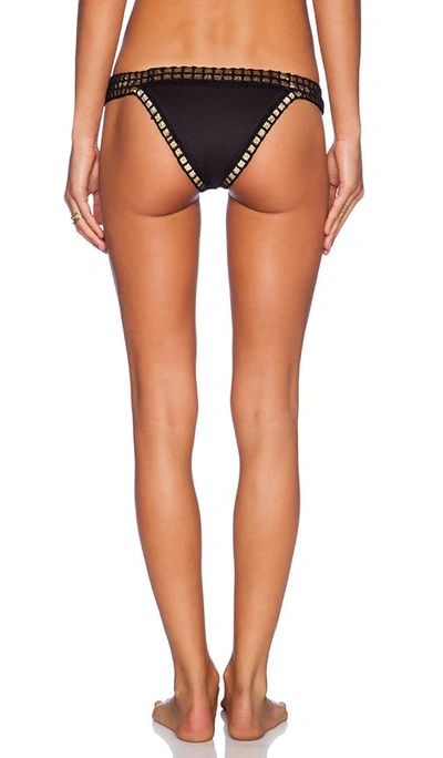 Shop Kiini Chacha Bikini Bottom In Black. In Black & Gold