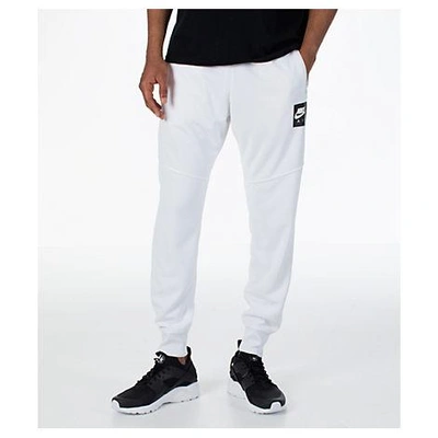 Shop Nike Men's Sportswear Air Track Jogger Pants, White