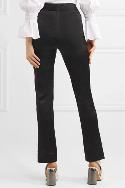 Shop Beaufille Lenae Satin Slim-leg Pants In Black
