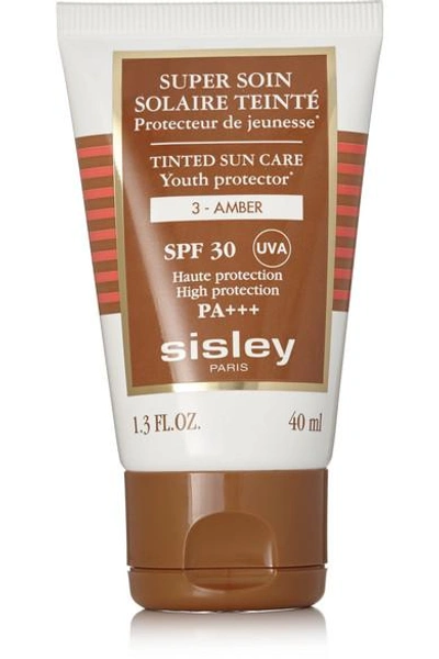 Shop Sisley Paris Tinted Sun Care Youth Protector Spf30 - 3 Amber, 40ml In Colorless