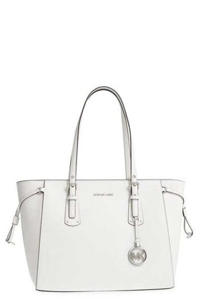 Shop Michael Kors Voyager Leather Tote - White In Optic White